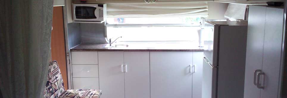 Toaster, kettle, microwave, fridge, TV, DVD Player